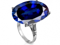 טבעת זהב לבן מעוצבת עם אבן גדולה כחולה